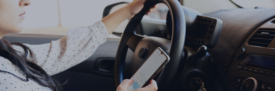 Woman texting while driving